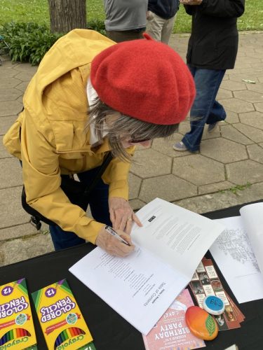 Kosfeld signing book
